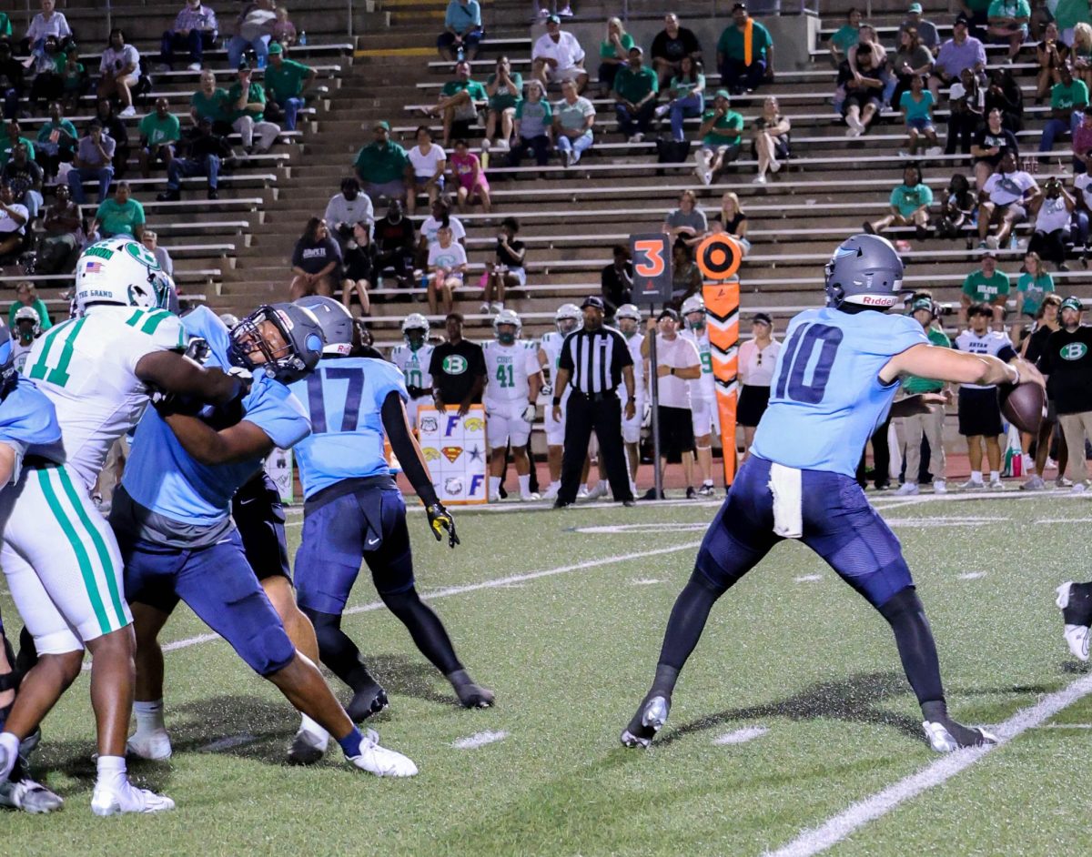 Senior quarterback Boone Turner looks downfield for an open receiver before letting the ball fly for a first down.
Read Article