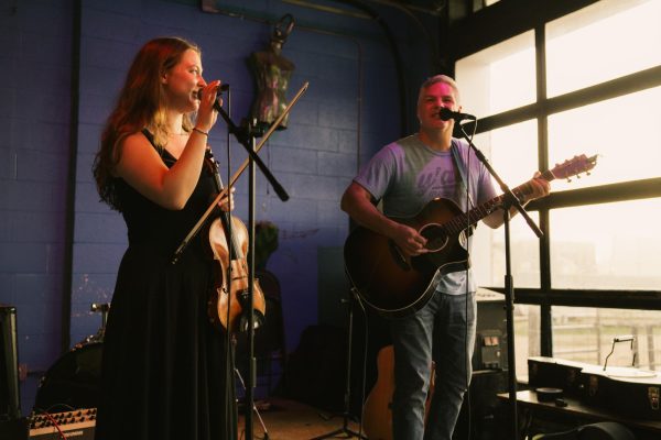 Junior Ruthie DeLeon and her father Dan DeLeon practice for their next gig.